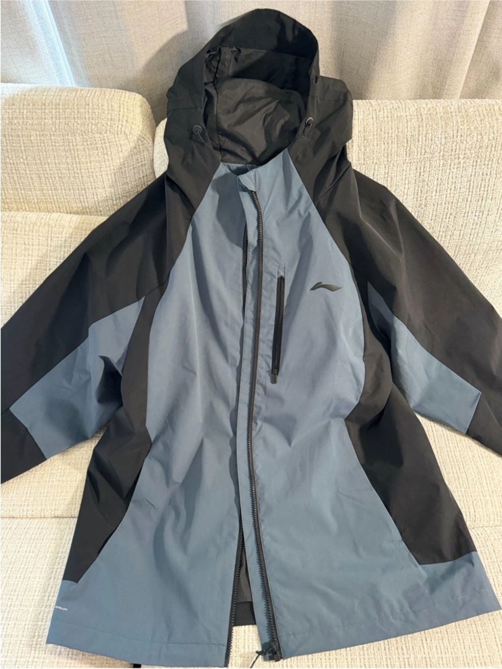 Li-Ning Light Blue and Black Waterproof Hooded Jacket